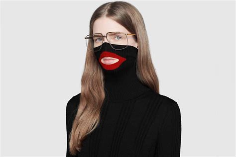 Gucci 'deeply sorry' for black jumper that 'resembles 